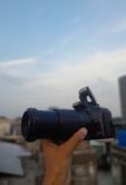 Canon 1000d with big auto lense and all asseries gift price