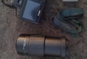 Canon 1000d with big auto lense and all asseries gift price