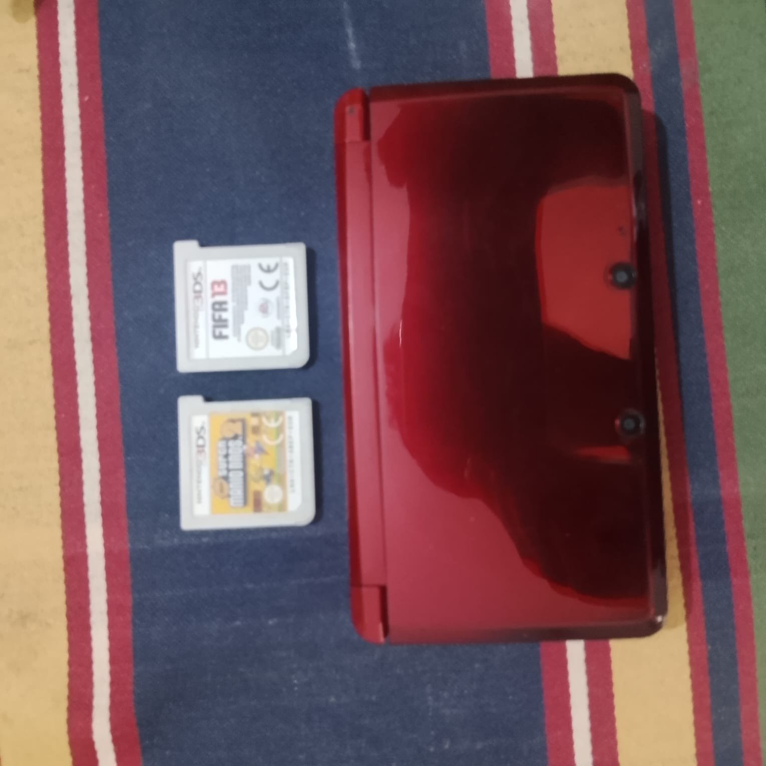 Nintendo 3DS 10/10 condition with original charger and games