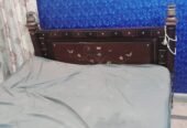 Wooden Double Bed without mattress.
