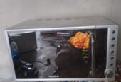 Microwave oven just like new no open no repire very less use