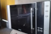 Microwave oven just like new no open no repire very less use
