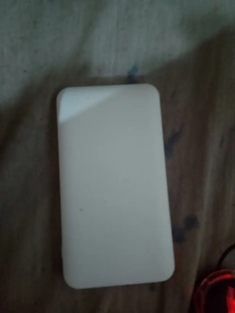 Slim 10,000mAh Power Bank – Dual USB Ports (Like New)