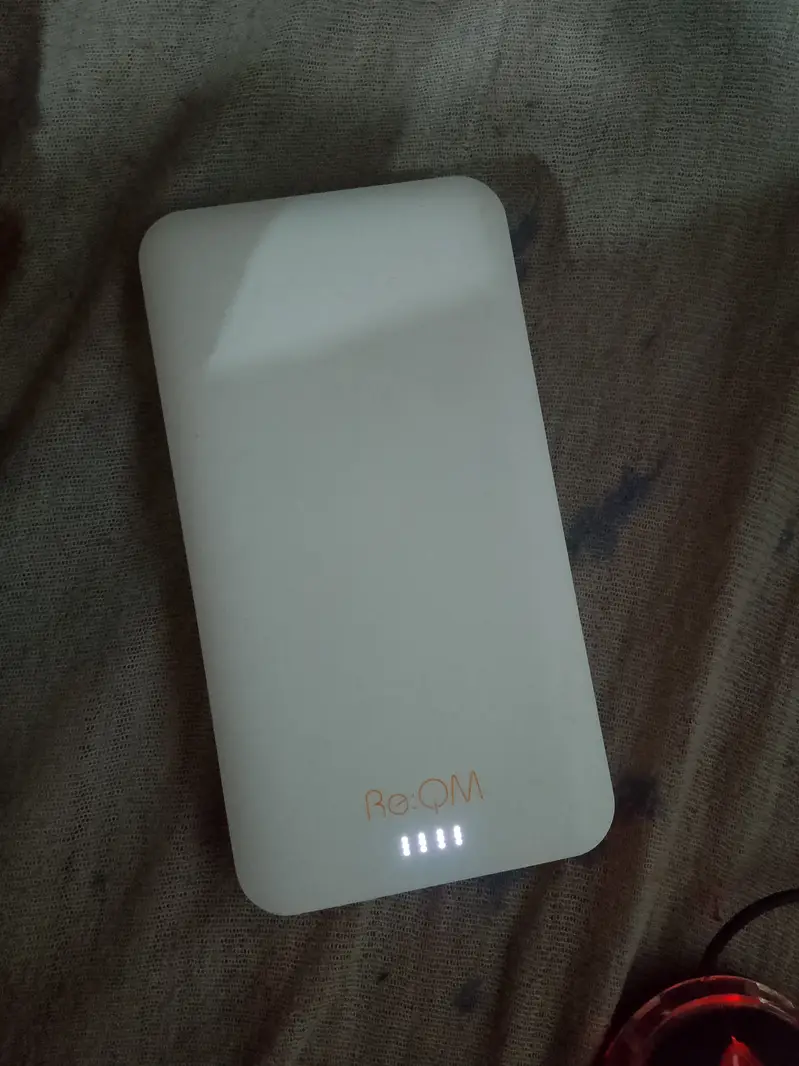 Slim 10,000mAh Power Bank – Dual USB Ports (Like New)