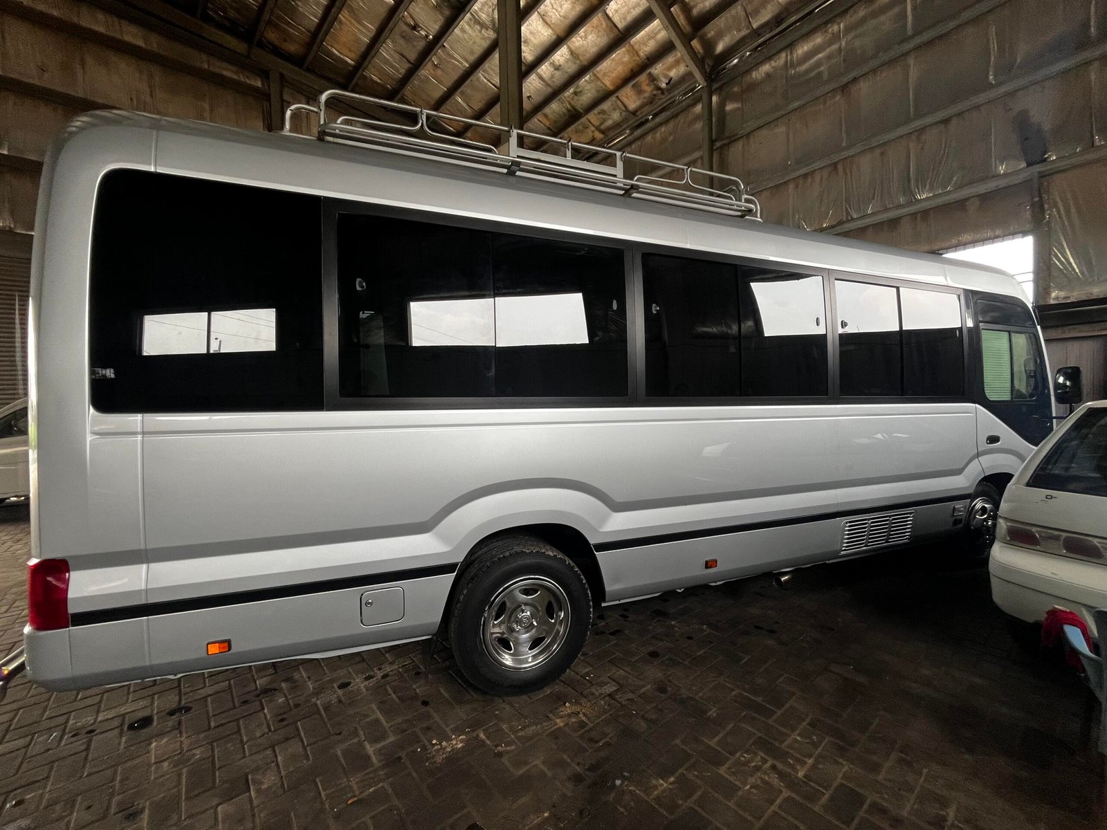 Toyota coaster 5c 29 seater bus available for rent booking