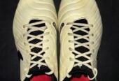 Nike teimpo football studs