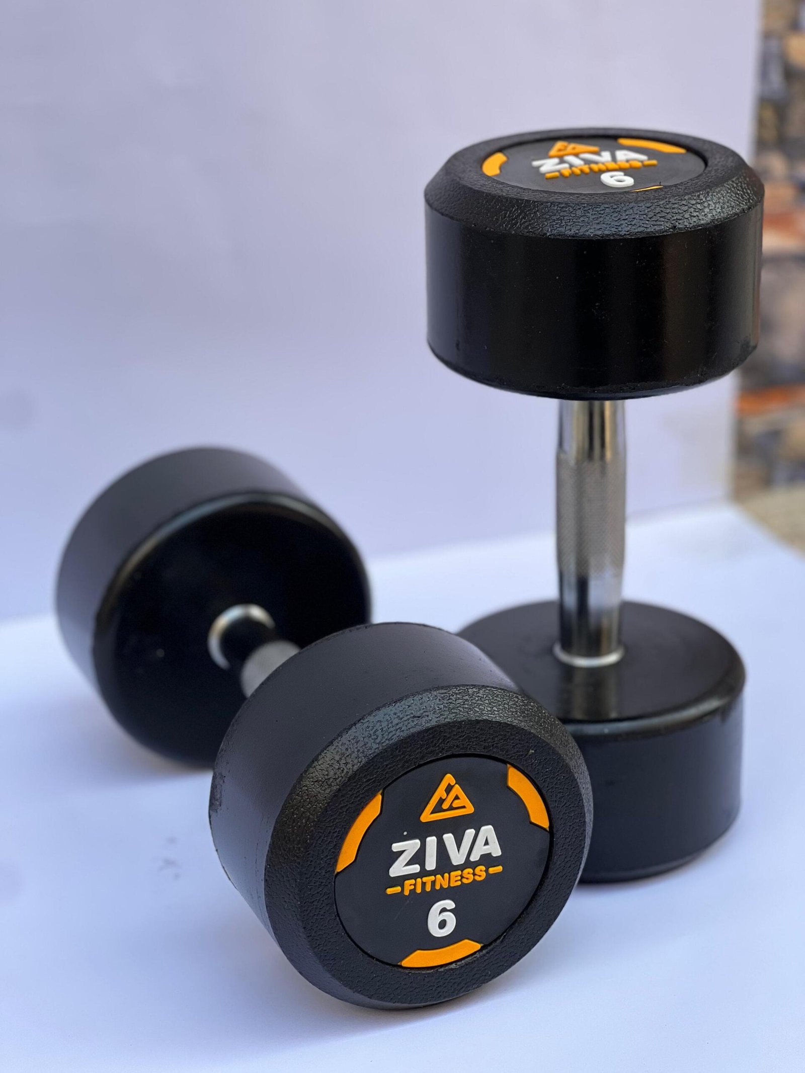 Rubber coated dumbbell