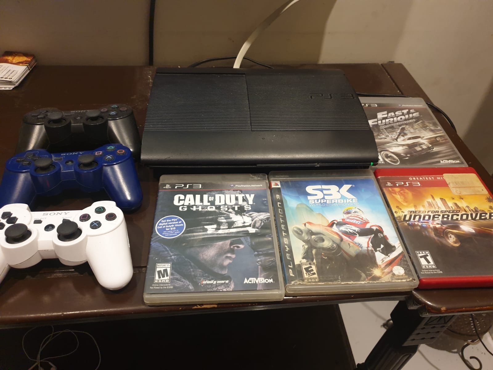 Playstation 3 with 2 controllers 30 games installed
