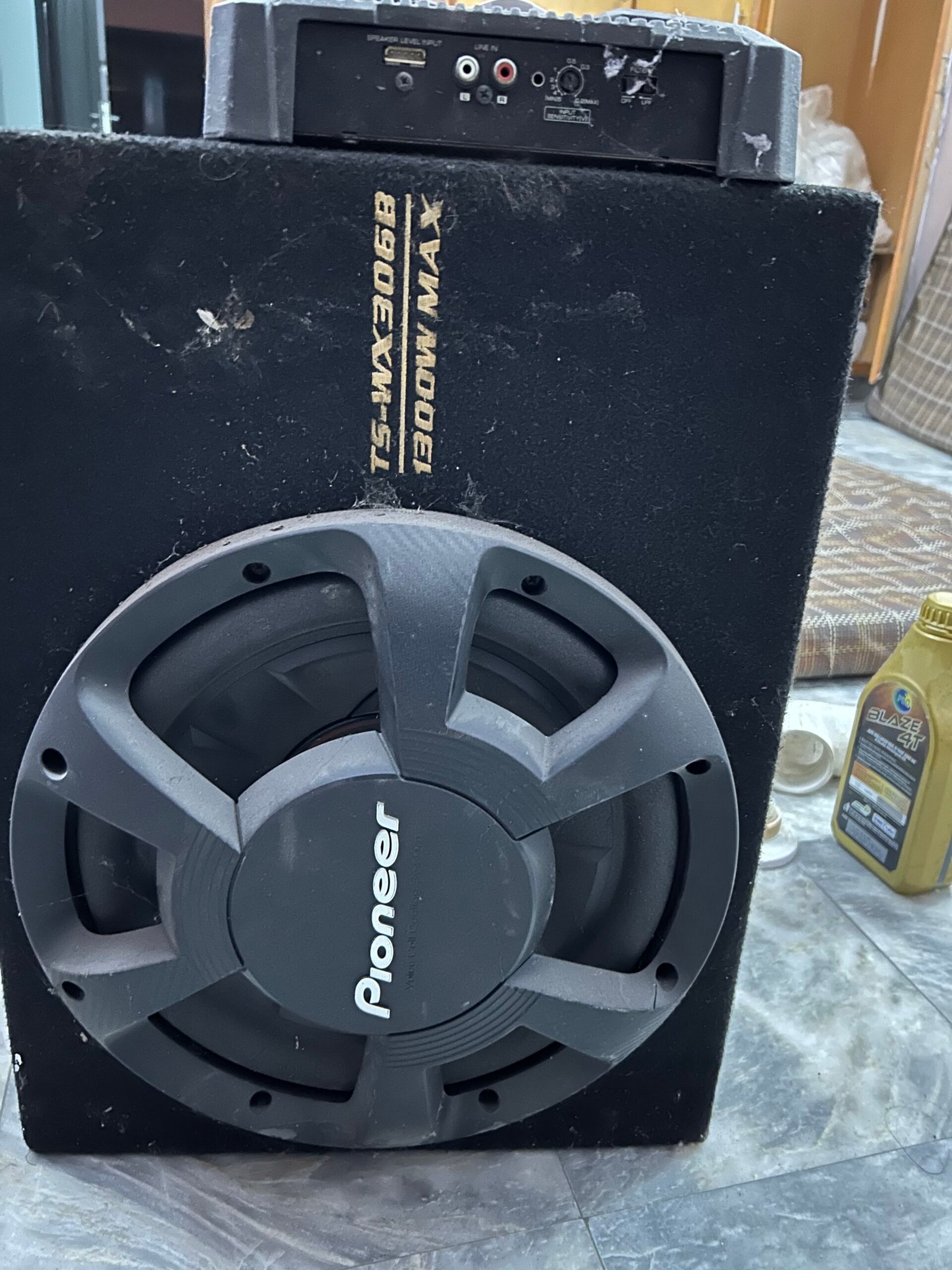 Kenwood 350W amp. Pioneer wx306B woofer